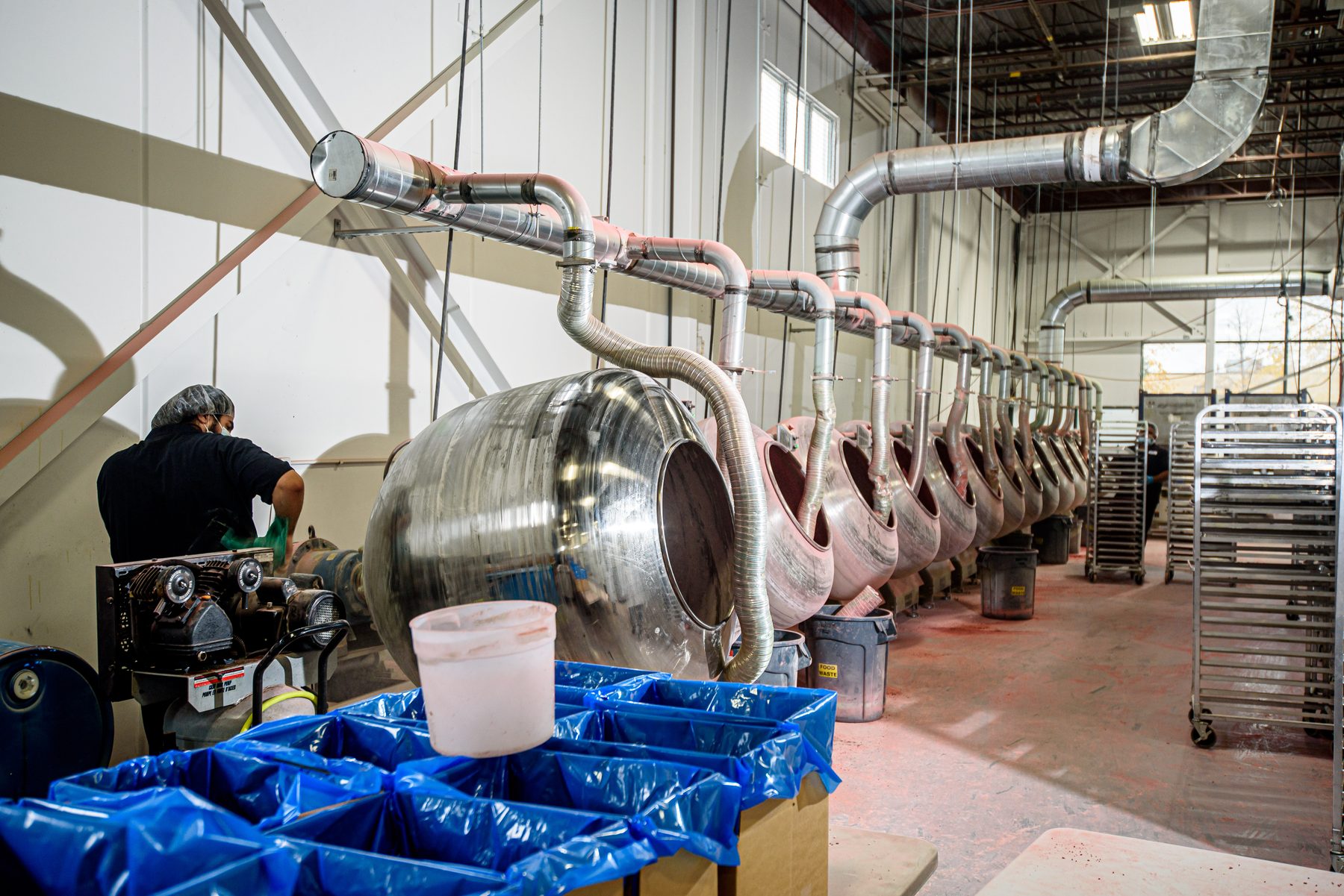 Manufacturing line with mixing tanks reviewed under VegeCert standards